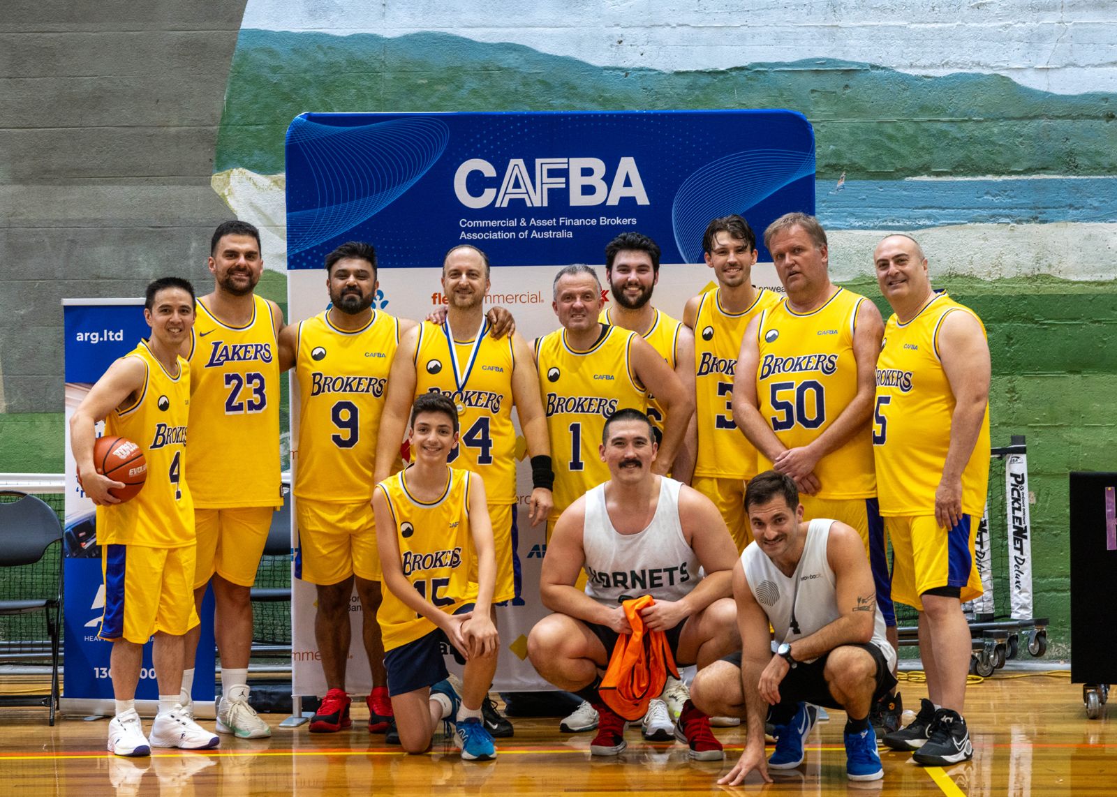 The Year 1 Brokers squad in yellow jerseys