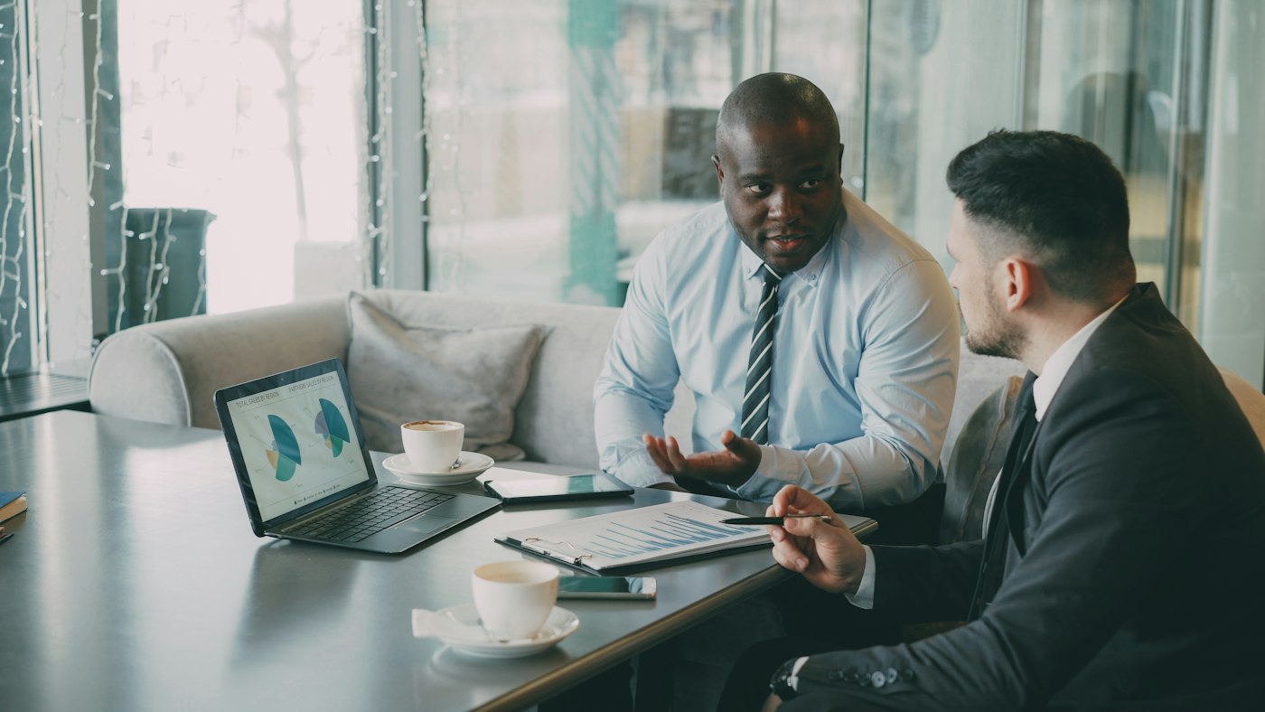 Finance broker discussing options with a client