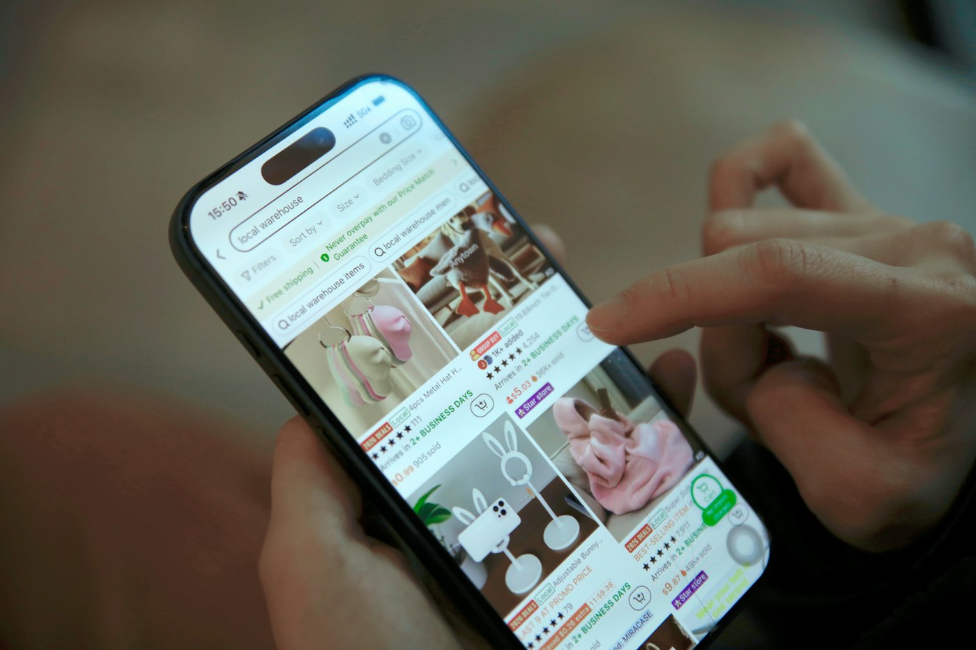 Person shopping online on a phone