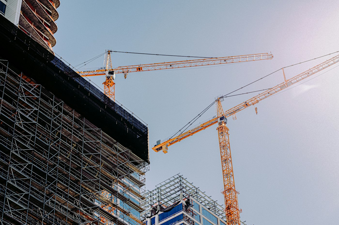 Crane beside a building under construction