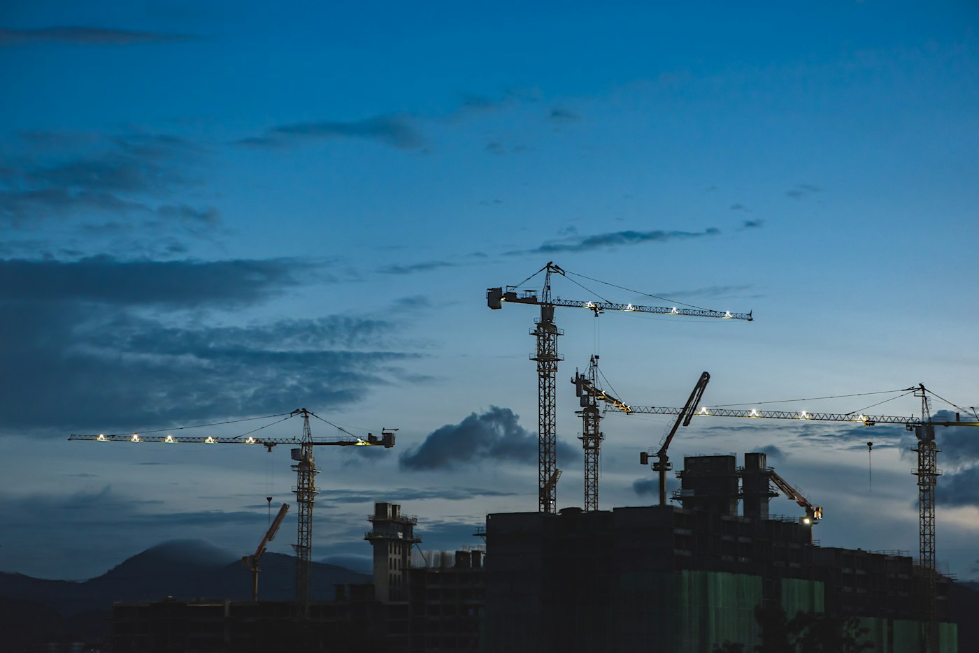 Tower cranes over a property development site