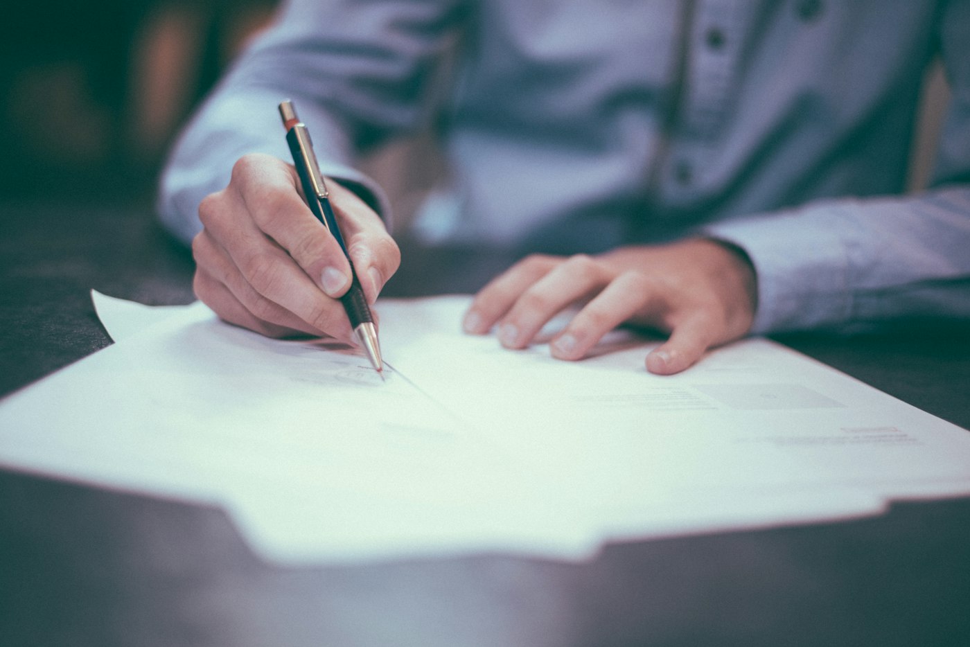 Person filling in a loan application